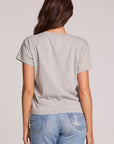 Back view of a woman wearing the Chaser Live Music Graphic Tee and blue jeans on a neutral background