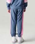 Back view of a girl wearing the Chaser Multi Stripes Girls Jogger on a neutral background