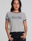 Front view of a woman wearing the Chaser NYC 68 Ringer Graphic Tee on a neutral background