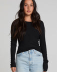 Front view of a woman wearing the Chaser Porta Black Long Sleeve on a neutral background