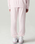 Back view of a girl wearing the Chaser Power Bolt Girls Jogger on a neutral background