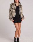 A full body front view of a woman wearing the Chaser Puff Sleeve Grey Wolf Jacket on a neutral background