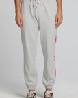 Front view of a woman wearing the Chaser Shocking Bolt Pants on a neutral background with arms lowered at sides
