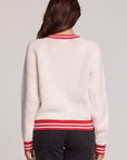 Back view of a woman wearing the Chaser Ski Longsleeve on a neutral background with arms at sides