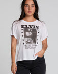 Front view of a woman wearing the Chaser Sun Records Elvis 1972 Tee on a neutral background with arms at sides and black pants