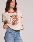 Front view of a woman wearing the Chaser The Rolling Stones Retro Tongue Tee on a neutral background with jeans
