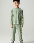 A full body front view of a boy wearing the Chaser Touchdown Boys Tee on a neutral background