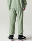Back view of a boy wearing the Chaser Touchdown Pants Boys Jogger on a neutral background