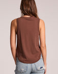 Back view of a woman wearing the Chaser Flouncy Kahlua Muscle Tank on a neutral background