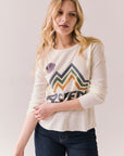 Front view of model wearing Aspen 1979 Long Sleeve in white