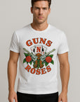 Man wearing a white t-shirt with 'Guns N' Roses' graphic design on a plain background