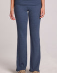 Front view of a woman wearing the Chaser Noorh Dark Denim Pants with arms at side