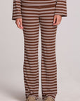 Front view of a woman wearing the Chaser Noorh Nutty Brown Stripe Pants on a neutral background with arms at sides