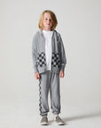 Full body front view of a boy wearing the Chaser Paxton Heather Grey Zip Up Hoodie on a neutral background