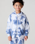 Front view of a boy wearing the Chaser Paxton Mistel Tie Dye Zip Up Hoodie on a neutral background
