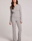A full body front view of a woman wearing the Chaser Rhose Light Heather Grey Pants on a neutral background