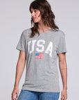 Side angle of Chaser USA Flag Oversized Tee in Streaky Grey featuring bold collegiate USA lettering and soft triblend drape