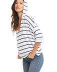 Blue and white striped 3/4 sleeve knit hoodie with side slits and relaxed fit.