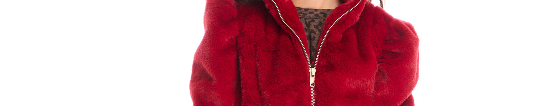 Cropped view of Chaser Kids girls’ faux fur jacket in bold rouge with front zip and puff sleeve detail