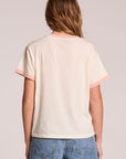 Back view of a woman wearing the Chaser  Avec Le Band Tee on a neutral background