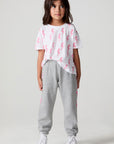 Full body front view of a girl wearing the Chaser  Bolting Bolt Pant on a neutral background
