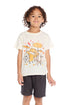 Boy wearing the Chaser Kids Painterly Drum Set Tee with a colorful drum set graphic on a white background