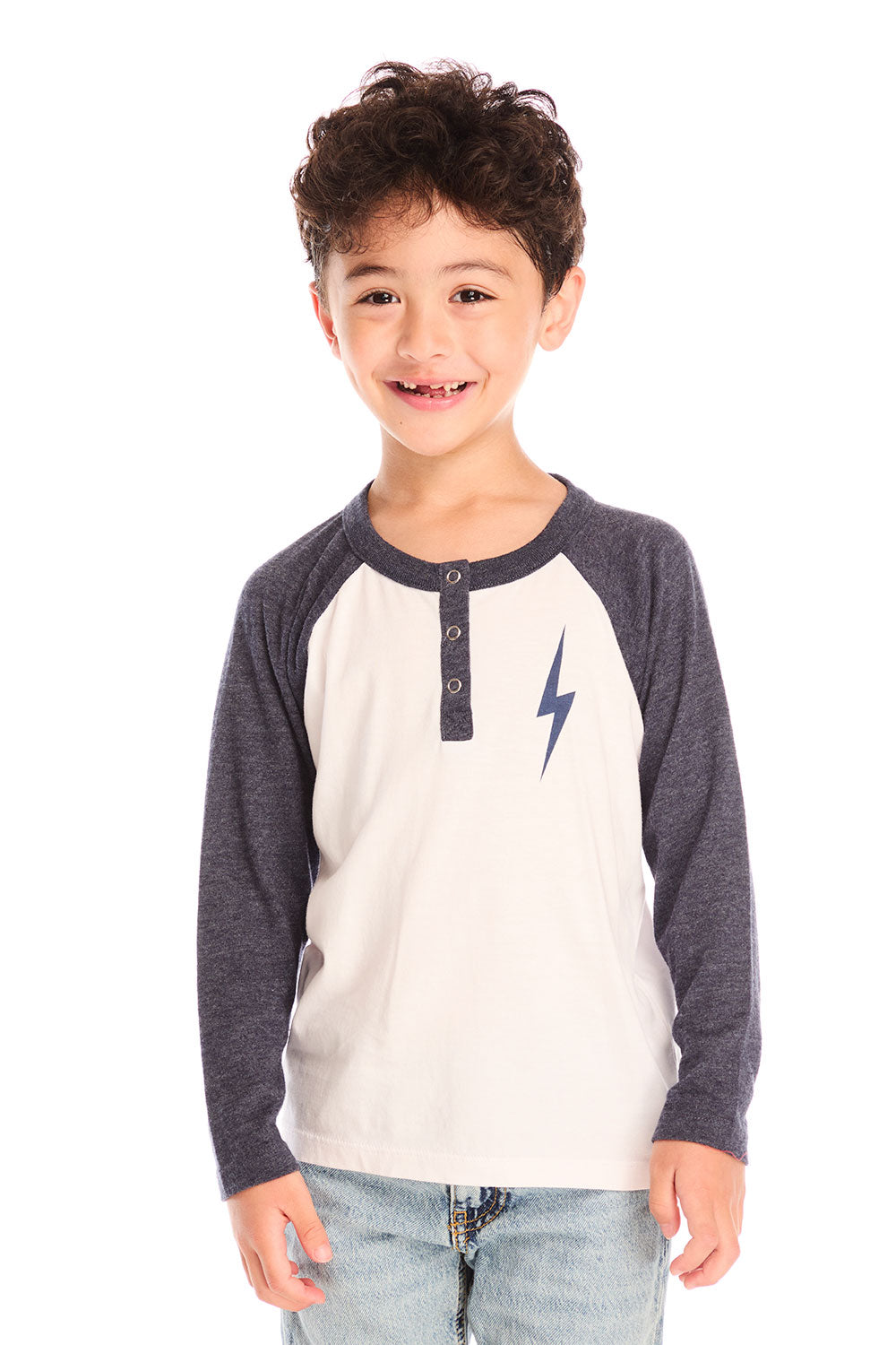 Front view of boy wearing Chaser’s Lightning Bolt henley long sleeve top with three buttons and bold lightning bolt graphic against a white background