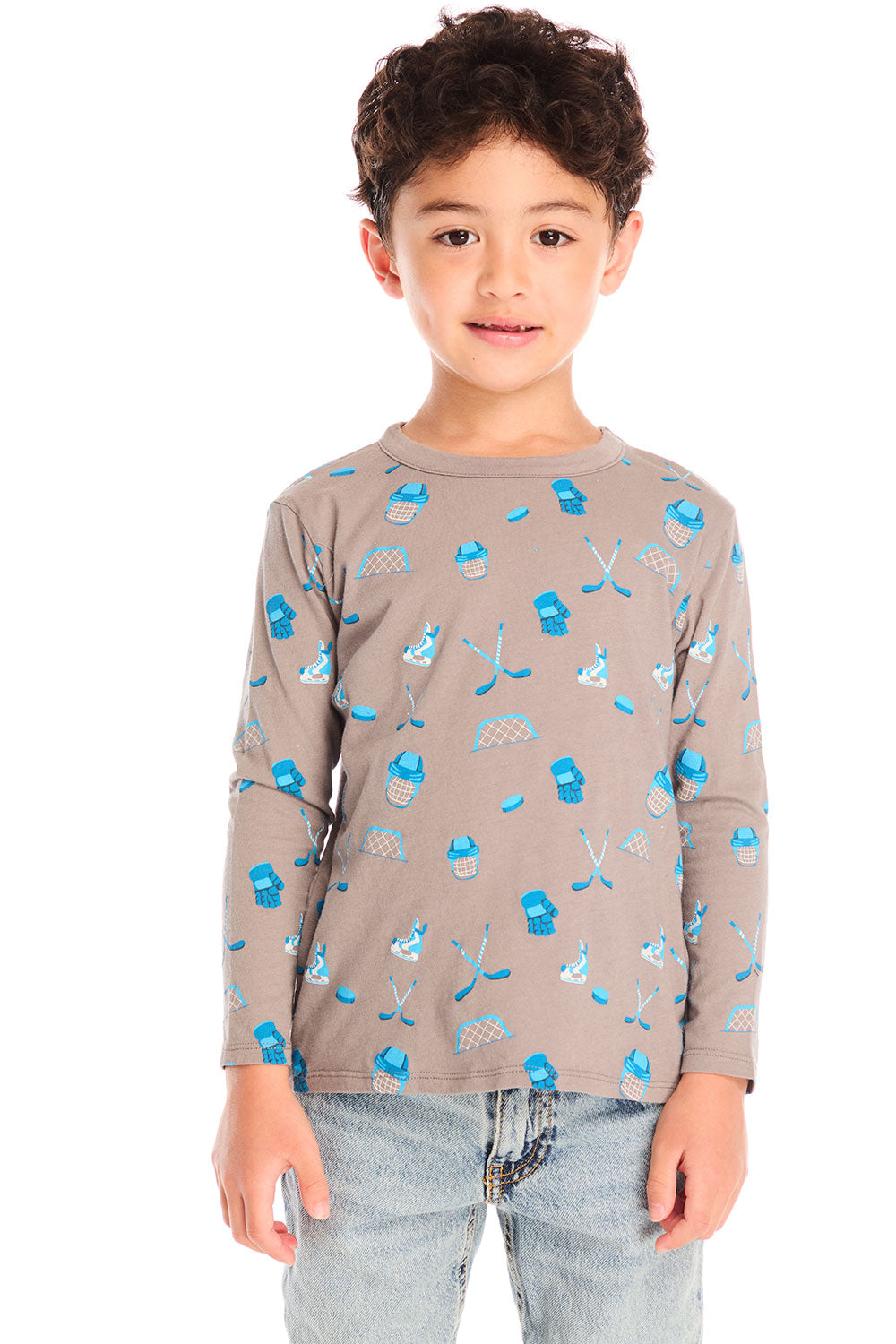 Front view of boy wearing Chaser’s Hockey Champ patterned long-sleeve top against a white background