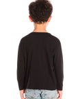 Back view of boy wearing Chaser’s Willie Nelson Willie 1978 black long sleeve shirt on a white background