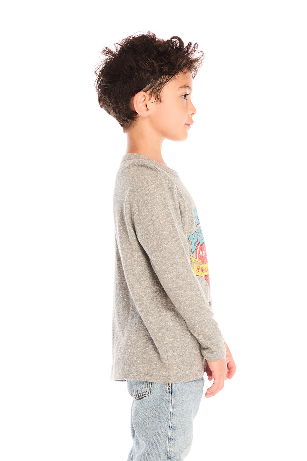 Side view of boy wearing Chaser’s Tom Petty Live On Tour gray long-sleeve top with graphic design and light blue jeans on a white background