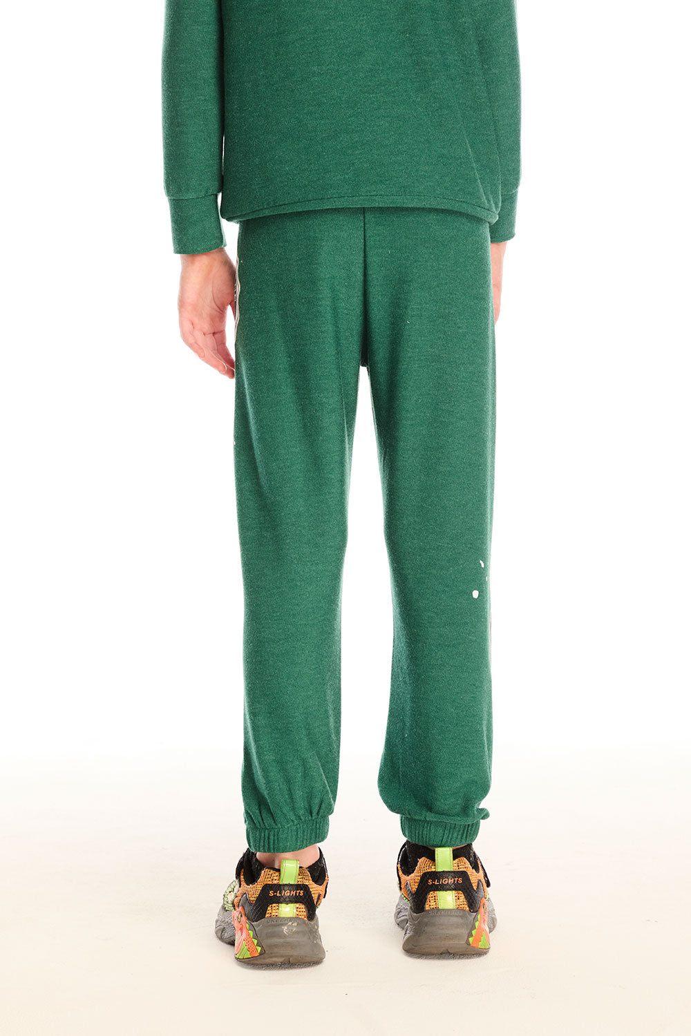 Back view of boy wearing Chaser’s Greatest Of All Time Everest Green pants with matching long sleeve top on a white background