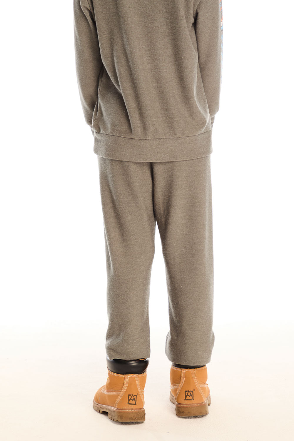 Back view of boy wearing Chaser’s Champion Racing Team pants in safari green with matching long sleeve top on a white background