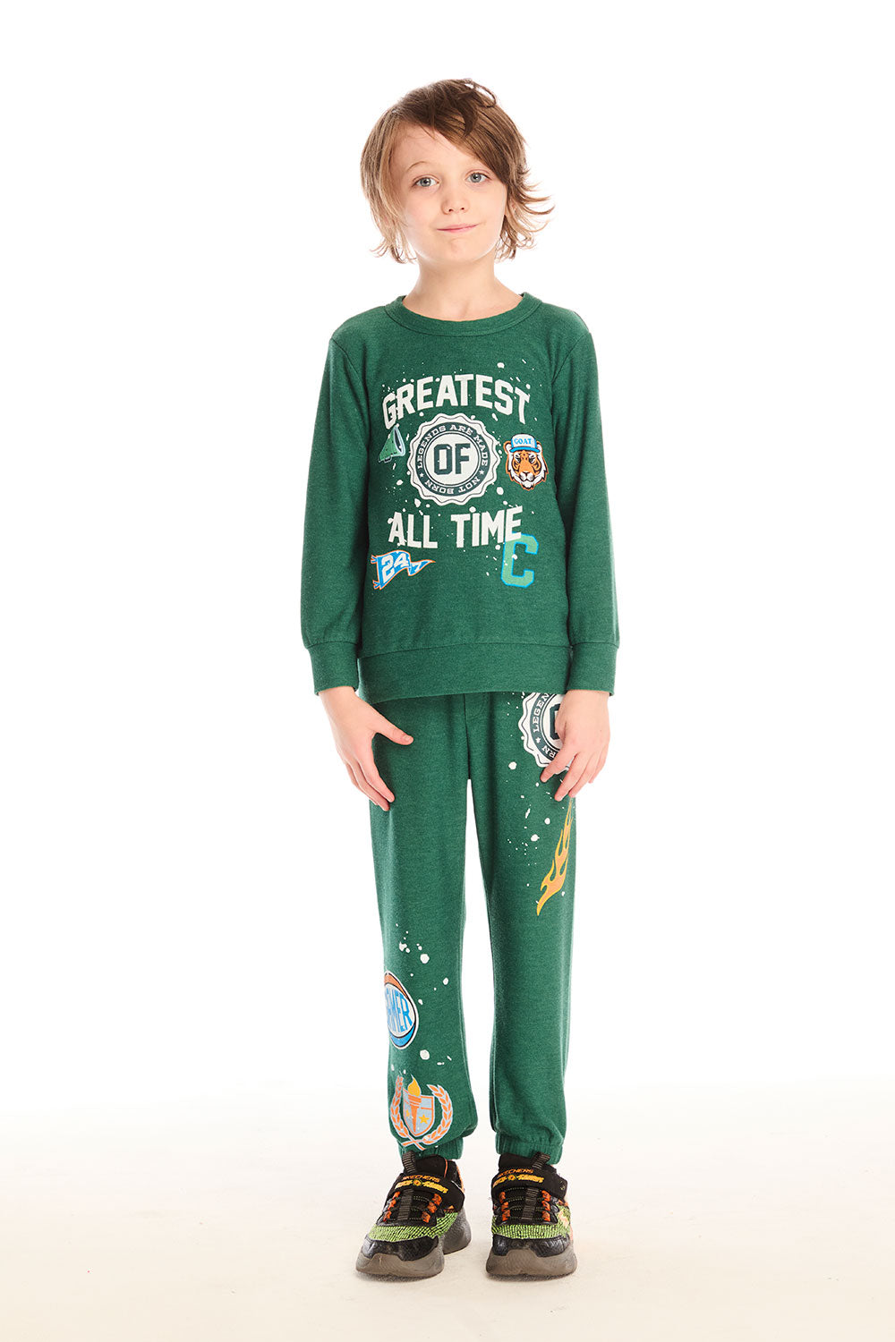 Full body view of boy wearing Chaser’s Greatest Of All Time Everest Green pants with matching long sleeve top on a white background