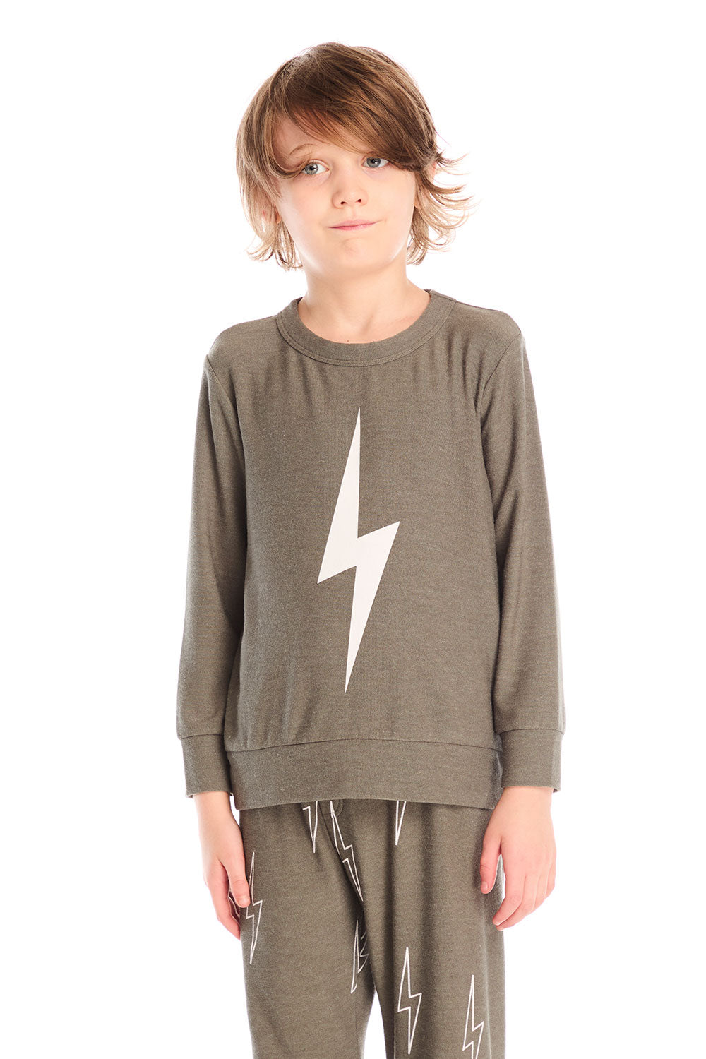 Boy wearing Chaser’s Bolt safari green long sleeve top with lightning bolt design and matching pants on a white background.