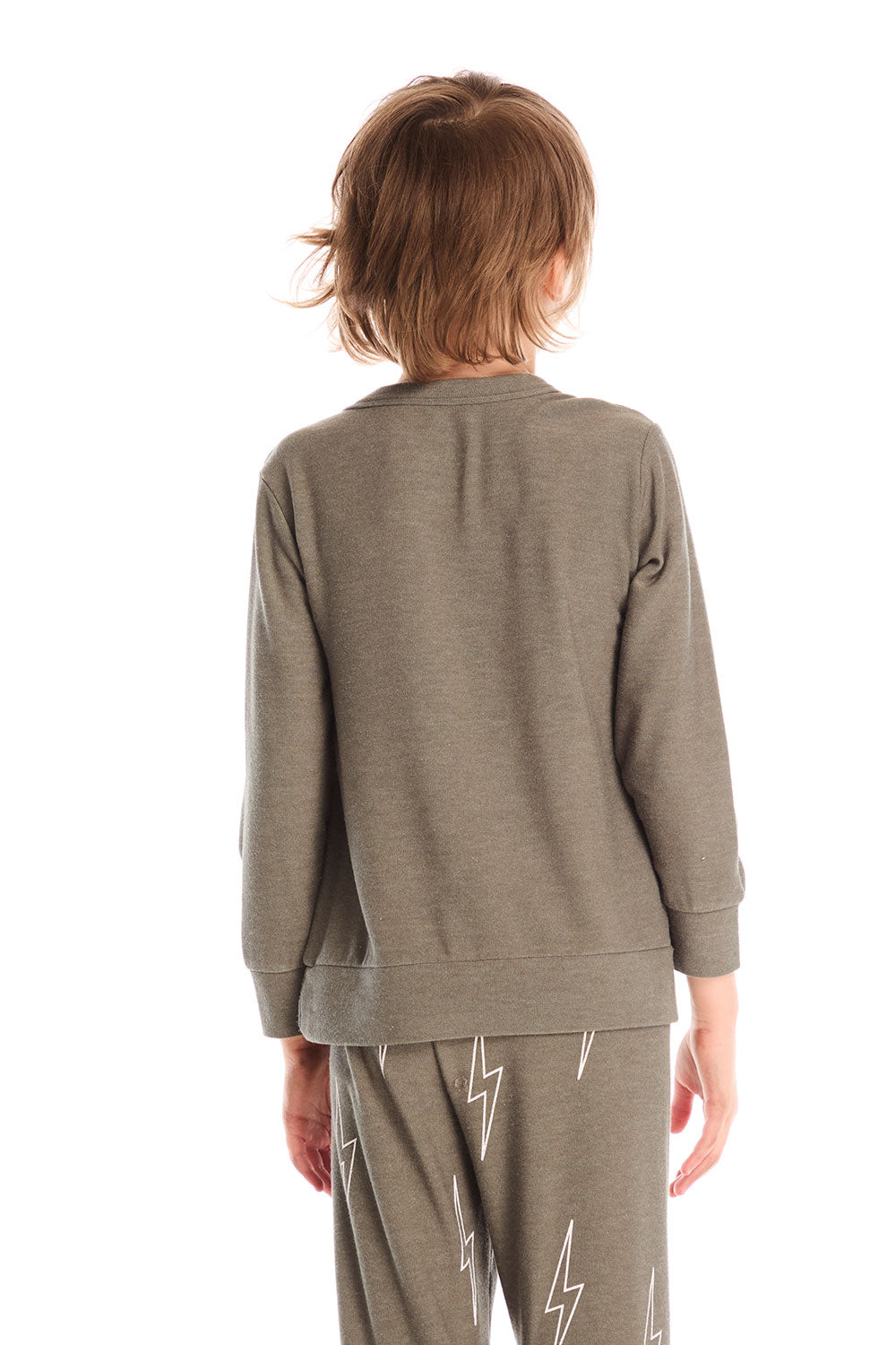Back view of boy wearing Chaser’s Bolt safari green long sleeve top with lightning bolt design and matching pants on a white background.