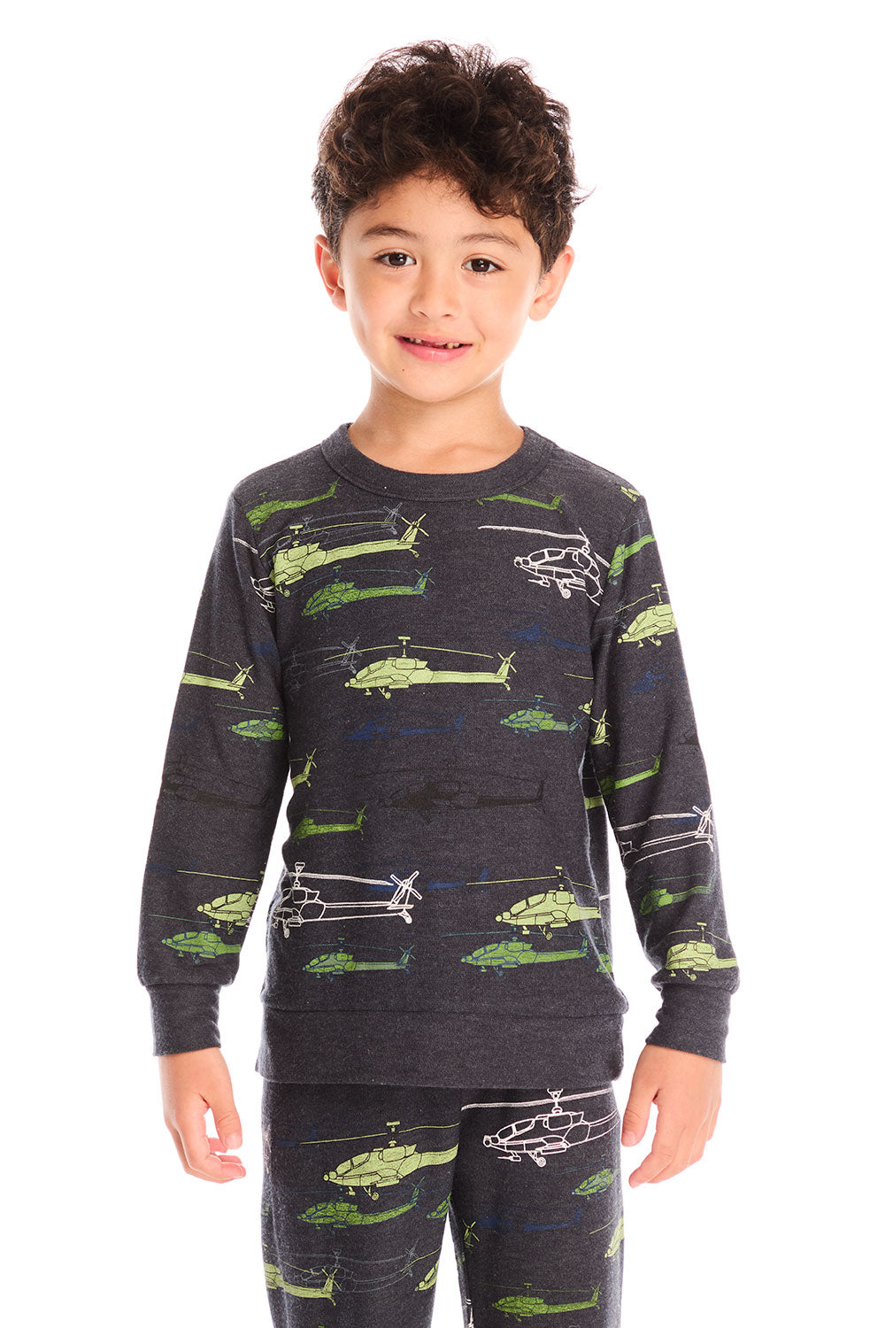 Boy wearing Chaser's dark gray Allover Helicopters long-sleeve shirt and matching pants with helicopter patterns on a white background