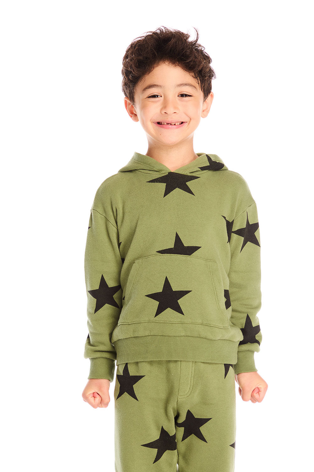 Boy wearing Chaser's Allover Stars  green hoodie and matching pants with black star patterns on a white background