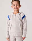 Model wearing Chaser's Sporty Colorblock Boys Zip-Up Hoodie in heather grey with colorblock detailing, front view