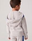 Model wearing Chaser's Sporty Colorblock Boys Zip-Up Hoodie in heather grey with colorblock detailing, back view