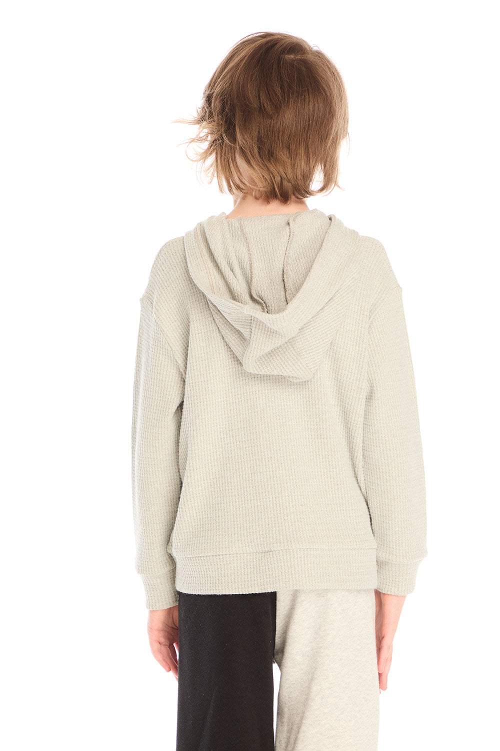 Back view of boy wearing Chaser’s Heather Grey Zip Up Hoodie with waffle texture against a white background