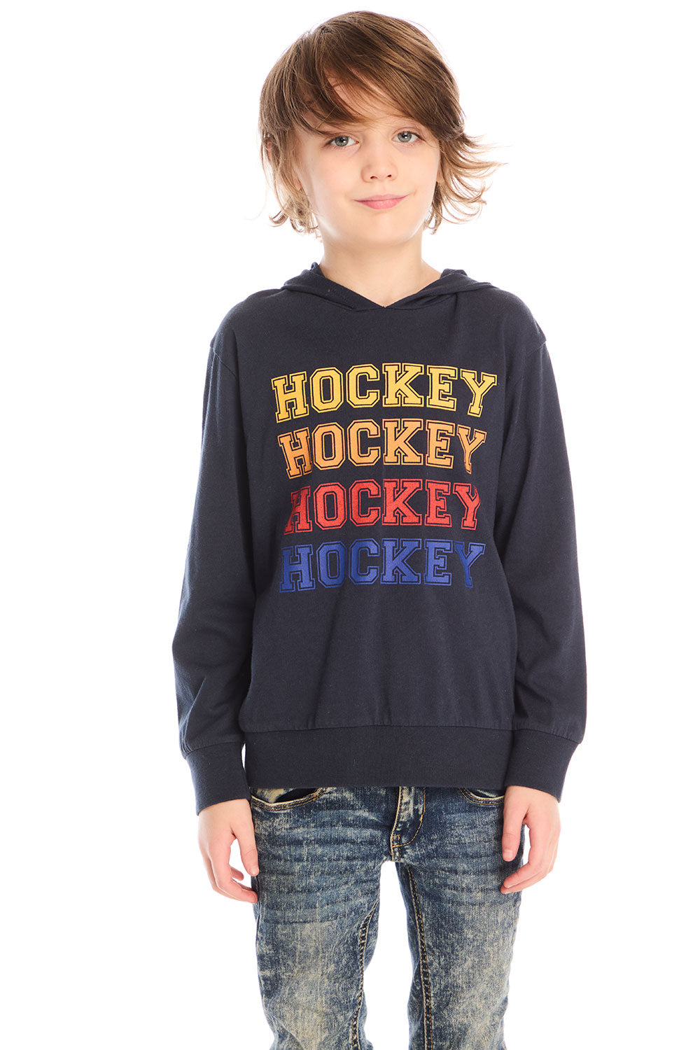 Front view of boy wearing Chaser’s Hockey navy blue pullover hoodie with multicolor ‘Hockey’ text against a white background