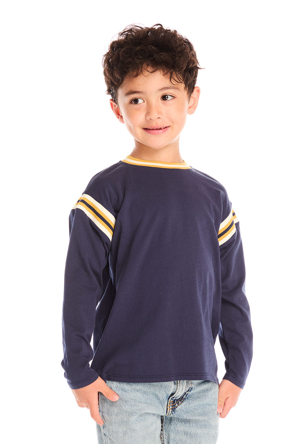 Front view of boy wearing Chaser’s I Am #1 navy long sleeve top with yellow stripes against a white background