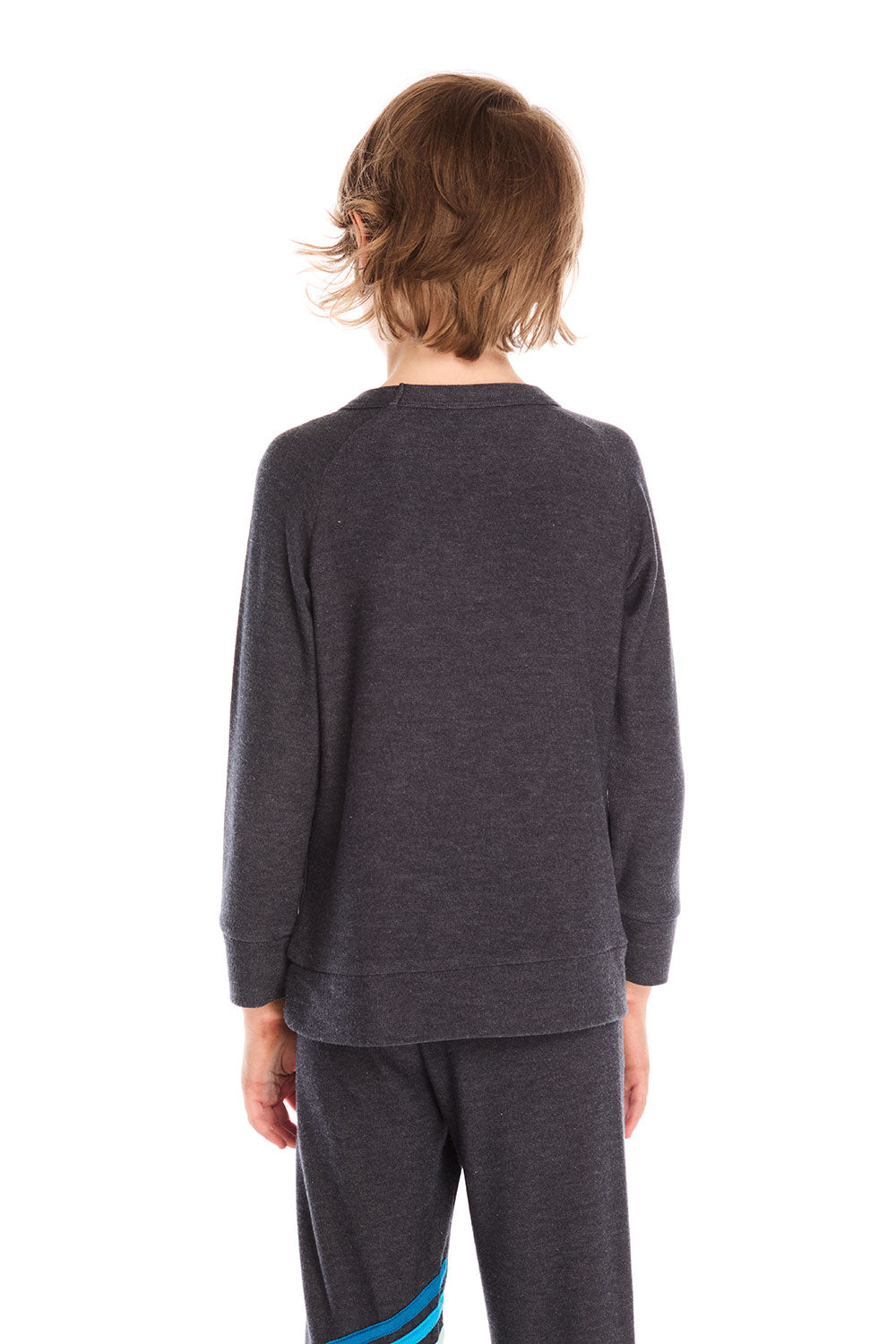 Back view of boy wearing Chaser’s Raglan Avalon Blue Pullover top with strappings on a white background