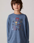 Model wearing Chaser's Champions Boys Long Sleeve Tee in blueberry jam with distinctive graphic and design details, front view