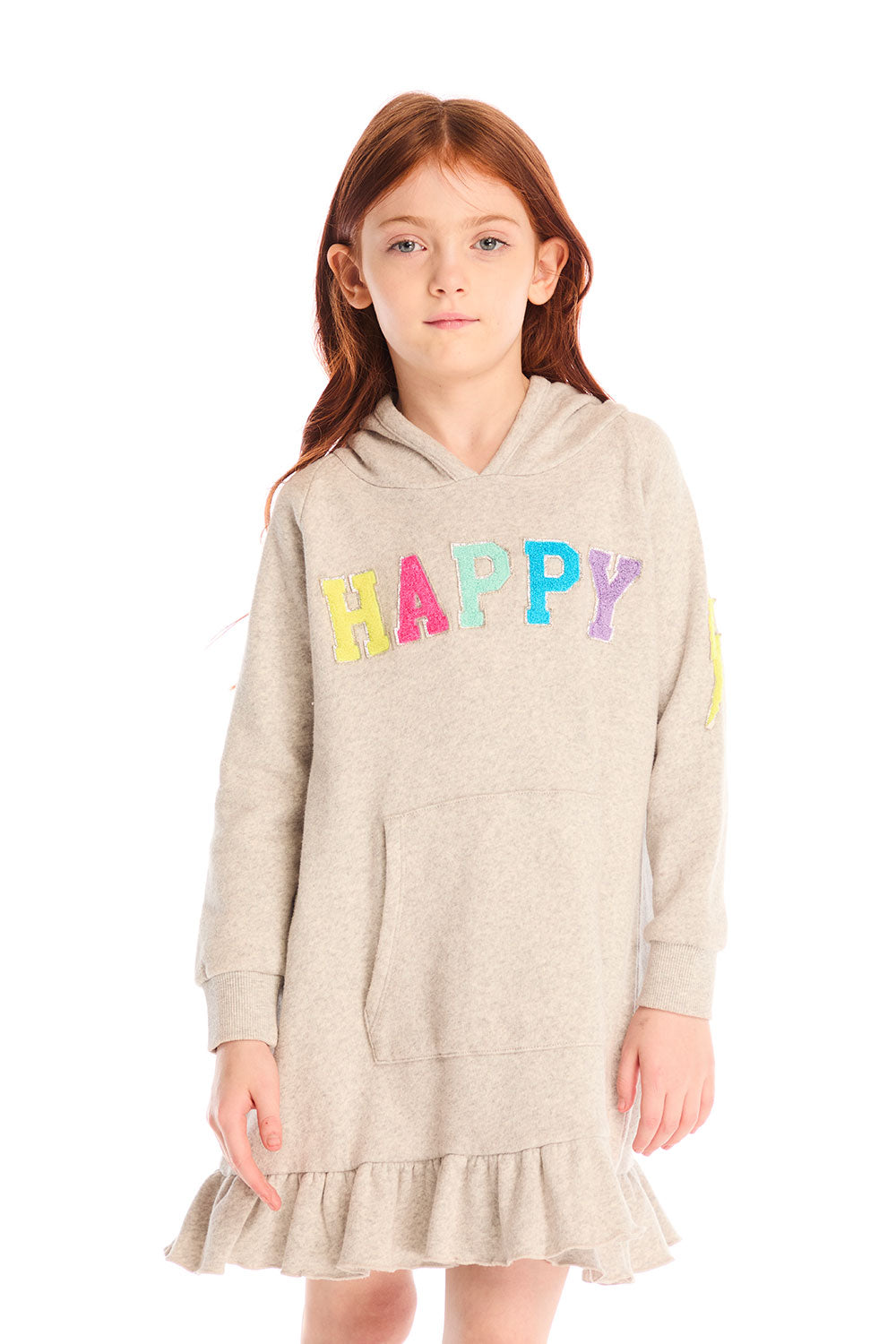 Girl wearing Chaser’s Glitter Smiley Heather Grey Hoodie Dress with long sleeves and colorful letters spelling “HAPPY” on the front against a white background