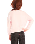 Back view of young girl wearing Chaser’s pink Be Happy Icons long sleeve pullover with smiley face design on a white background