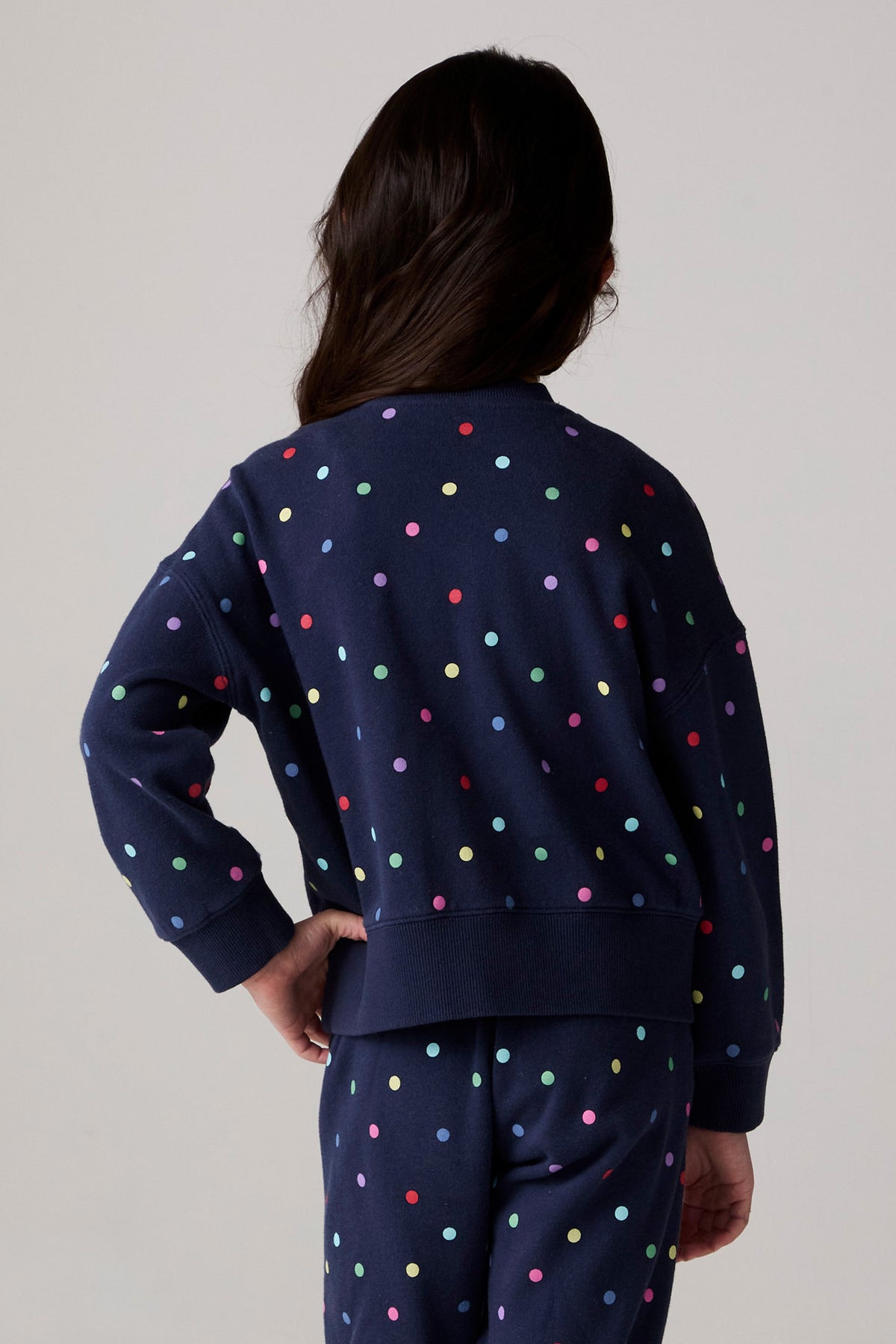 Model wearing Chaser's Festive Lights Girls Pullover in Avalon with distinctive graphic and design details, additional view