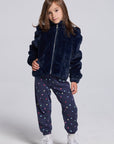 Chaser Kids Avalon Girls Puff-Sleeve Jacket in navy worn with dotted pants, full-body front view against a light gray studio background