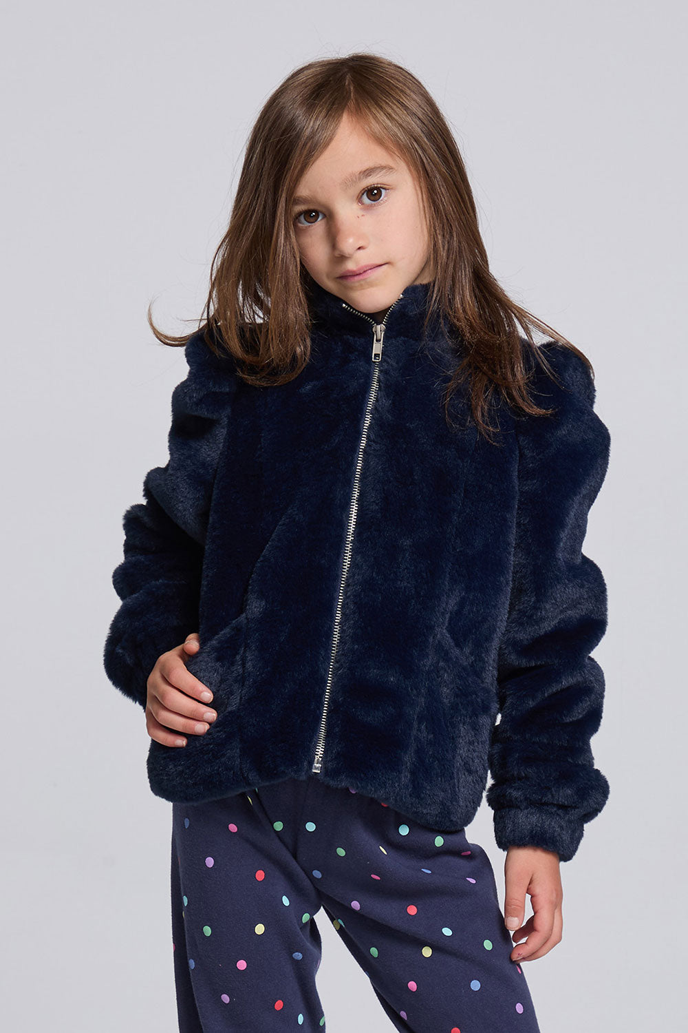 Chaser Kids Avalon Girls Puff-Sleeve Jacket in navy plush fabric with a front zipper, front view against a light gray studio background