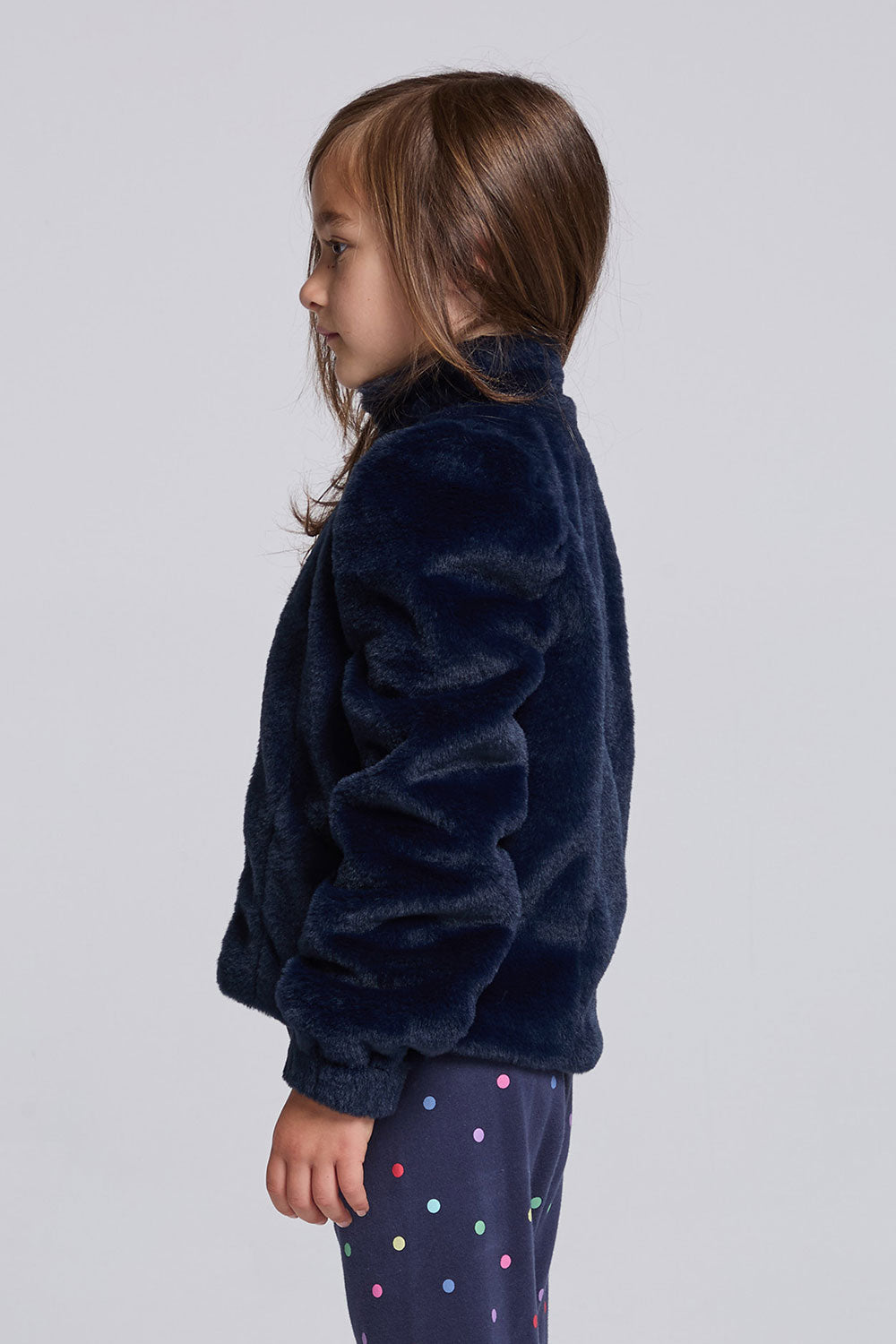 Chaser Kids Avalon Girls Puff-Sleeve Jacket in navy plush fabric, side view against a light gray studio background